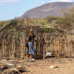 A Rendille woman building a new home (image by Inger Vandyke)