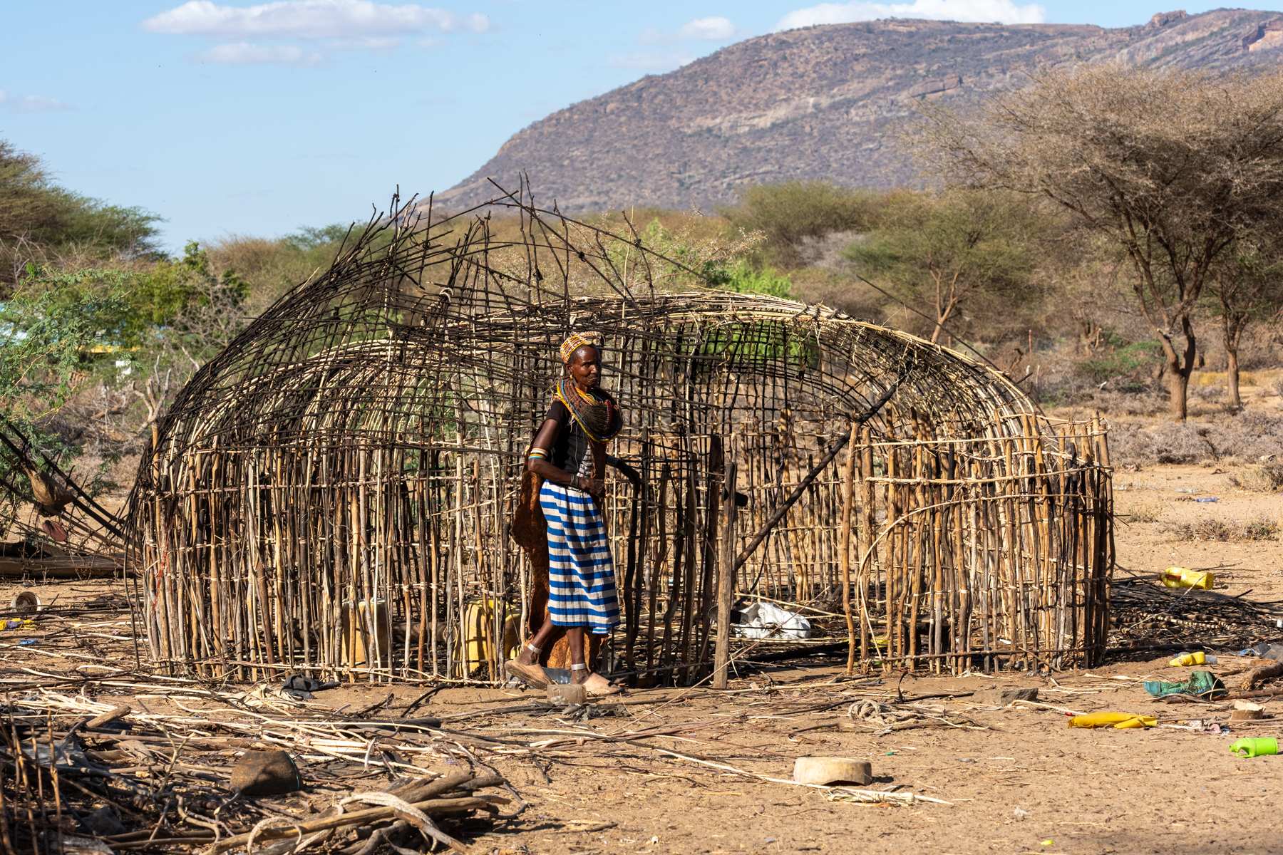 A Rendille woman building a new home (image by Inger Vandyke)