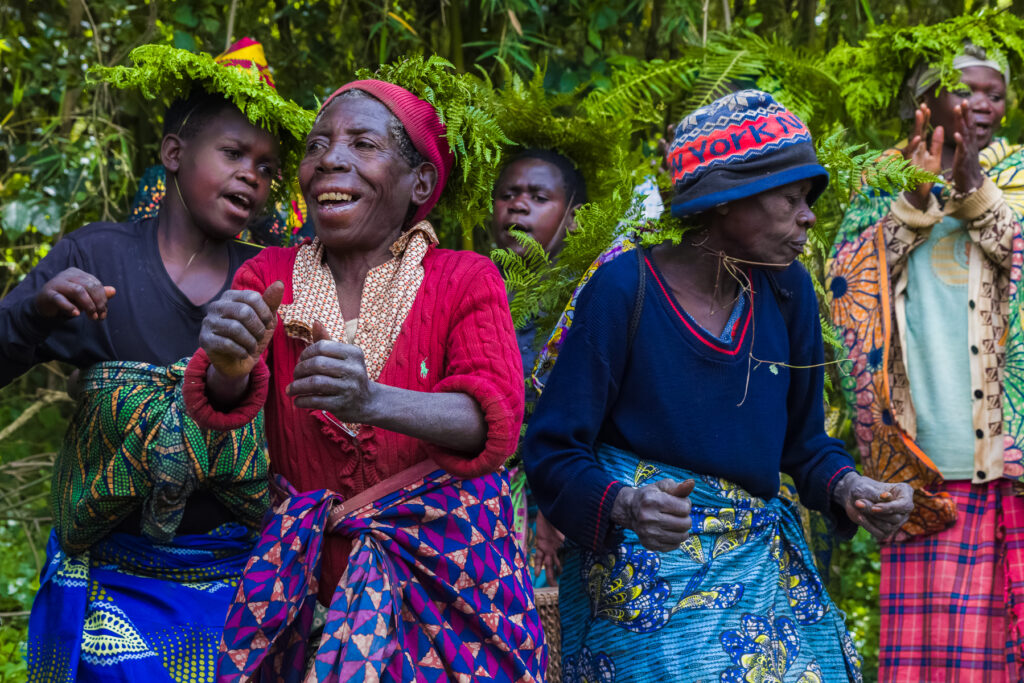 Echuya Twa women perform the traditional song and dance 'Inanga Nyamunini' - which praises the things that the forest provides: honey, medicinal plants and small game (image by Virginia Wilde)