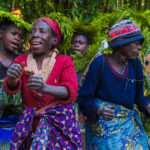 Echuya Twa women perform the traditional song and dance 'Inanga Nyamunini' - which praises the things that the forest provides: honey, medicinal plants and small game (image by Virginia Wilde)