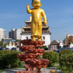 The Baby Buddha at Gandan Monastery. The footprints represent the seven steps he is said to have taken after his birth (image by Ingrid Koedood)