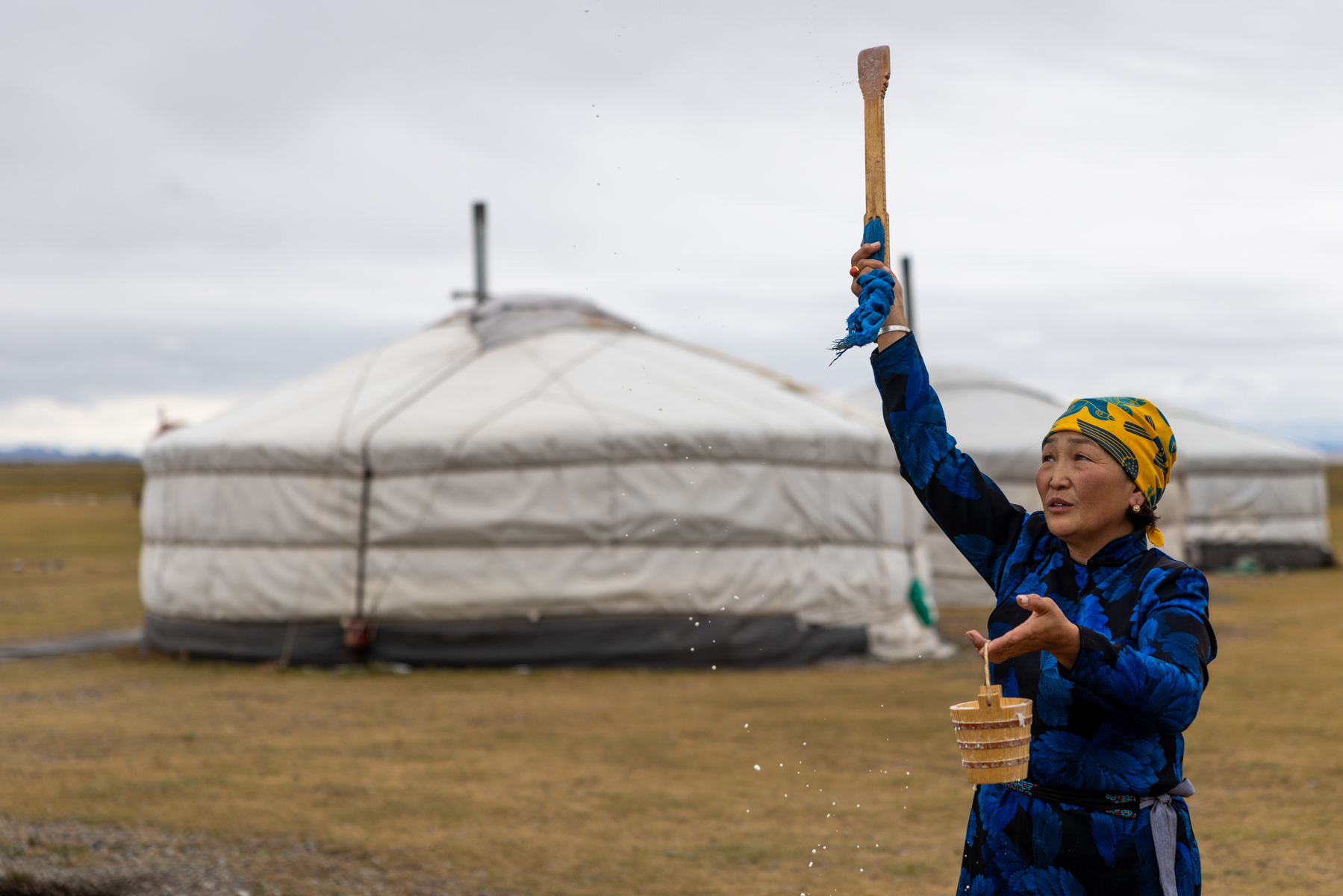 A traditional milk blessing, with milk sprinkled as a symbolic wish for good fortune and prosperity (image by Ingrid Koedood)