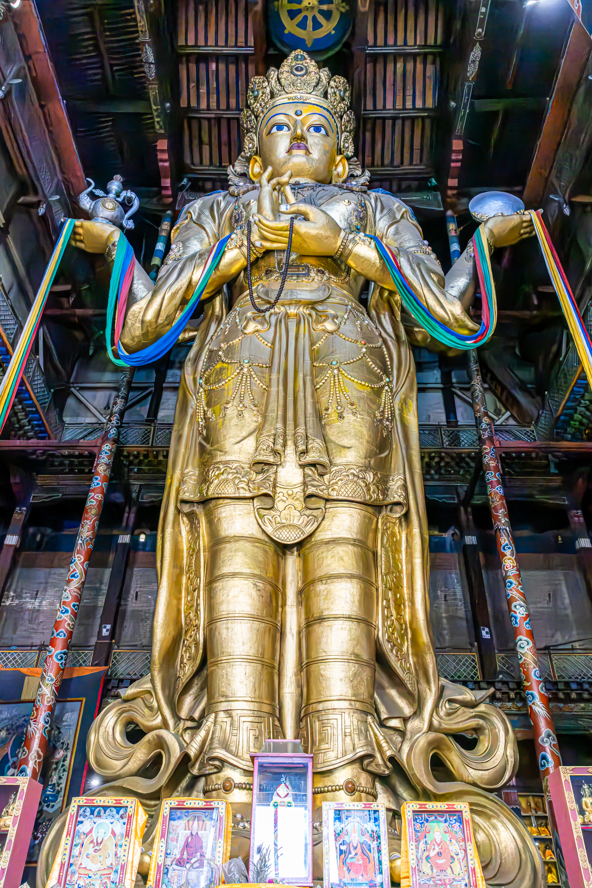 The impressive 26-metre high golden statue of Migjid Janraisig, towering inside Gandan Monastery in Ulaanbaatar (image by Ingrid Koedood)