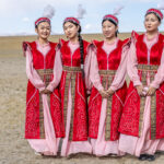 Young dancers rehearse in traditional dress before their performance at the Eagle festival (image by Ingrid Koedood)