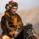 An eagle hunter taking part in one of the competitions during the Eagle Hunters festival (image by Ingrid Koedood)