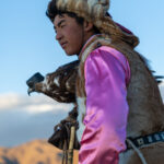 Portrait of Tilekjan with is two-year-old Golden Eagle (image by Ingrid Koedood)