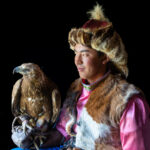 Tilekjan and his golden eagle during a portrait session inside the family yurt where we were staying (image by Ingrid Koedood)