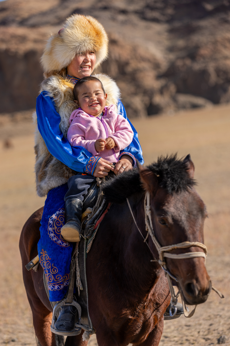 Horse riding starts young. Aymoldir shares her horse with her little sister, growing up with a way of life that is passed down from one generation to the next (image by Ingrid Koedood)