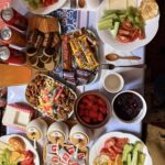 A generous breakfast spread, with far more on the table than we could ever finish (image by Ingrid Koedood)