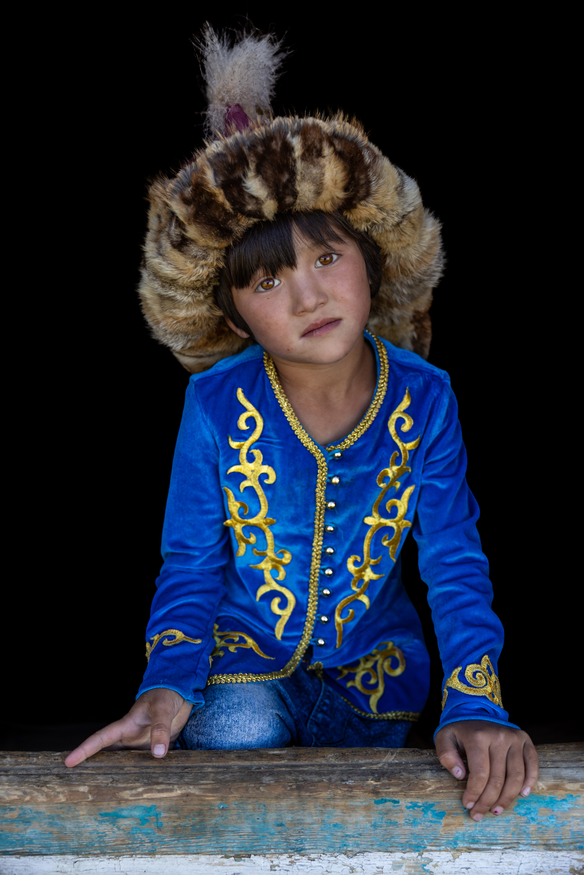 Morning life with a Kazakh family: while the women were busy milking the livestock, he took the opportunity to relax in the sun (image by Ingrid Koedood)