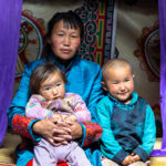 We were welcomed into the family’s yurt, where the mother and her children posed for our cameras (image by Ingrid Koedood)