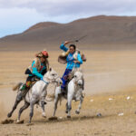 The game of Kuzkuar, where Kazakh women race after their male partners, trying to whip them (image by Ingrid Koedood)