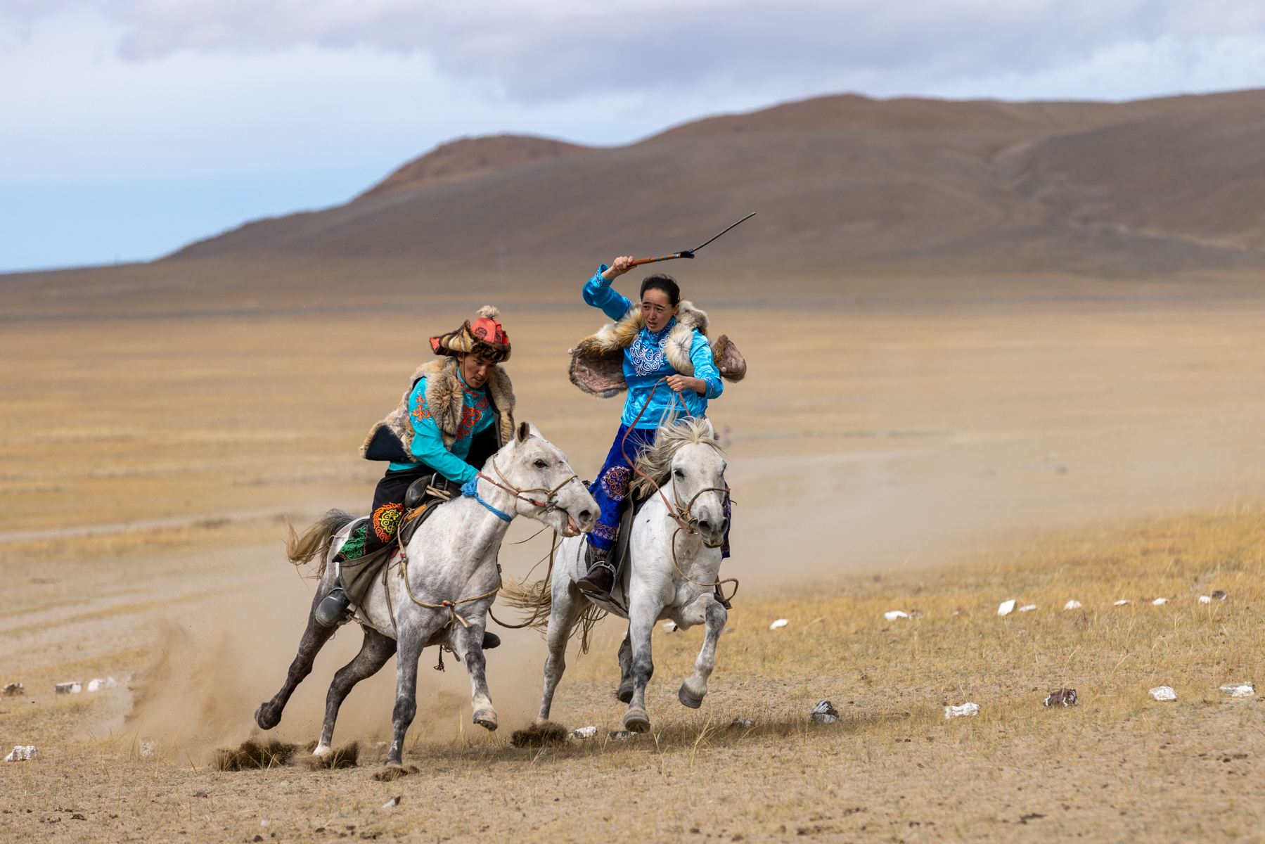 The game of Kuzkuar, where Kazakh women race after their male partners, trying to whip them (image by Ingrid Koedood)