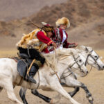 Kuzkuar, a traditional horseback chasing game between a man and a woman (image by Ingrid Koedood)