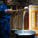 On our way to Ulaanbaatar a Mongolian family welcomed us for lunch in their ger. They showed us several traditional food-making techniques, including how they distil a vodka-like spirit from fermented dairy products (image by Ingrid Koedood)