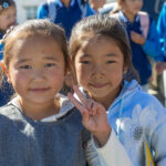 Two young friends we met in the schoolyard, happy to pose for the camera (image by Ingrid Koedood)