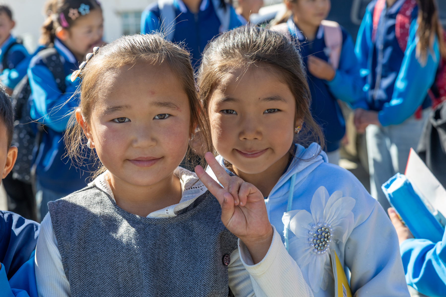 Two young friends we met in the schoolyard, happy to pose for the camera (image by Ingrid Koedood)